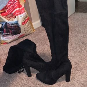 Thigh high black boots